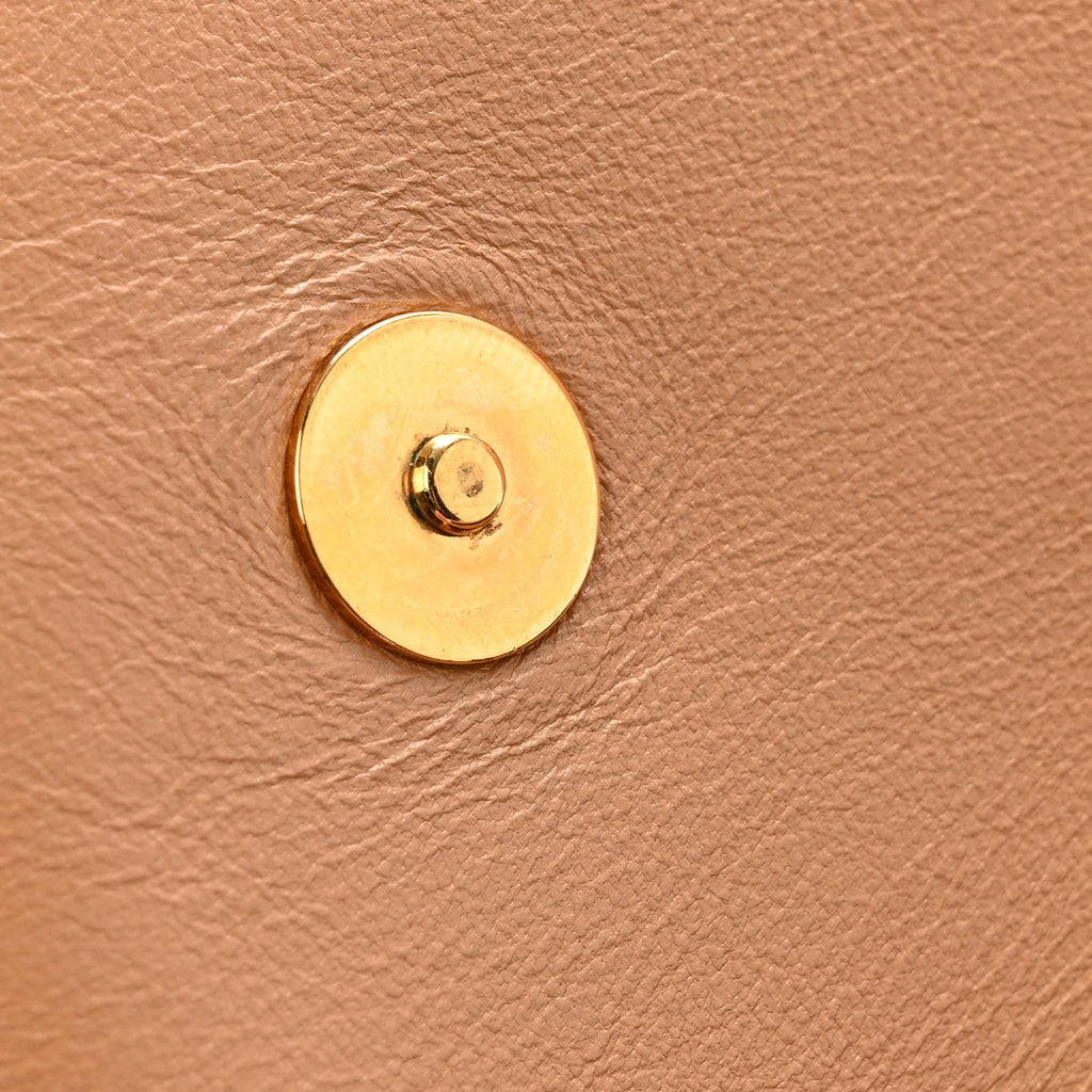 Lambskin Embossed Monogram Pochette Coussin Camel