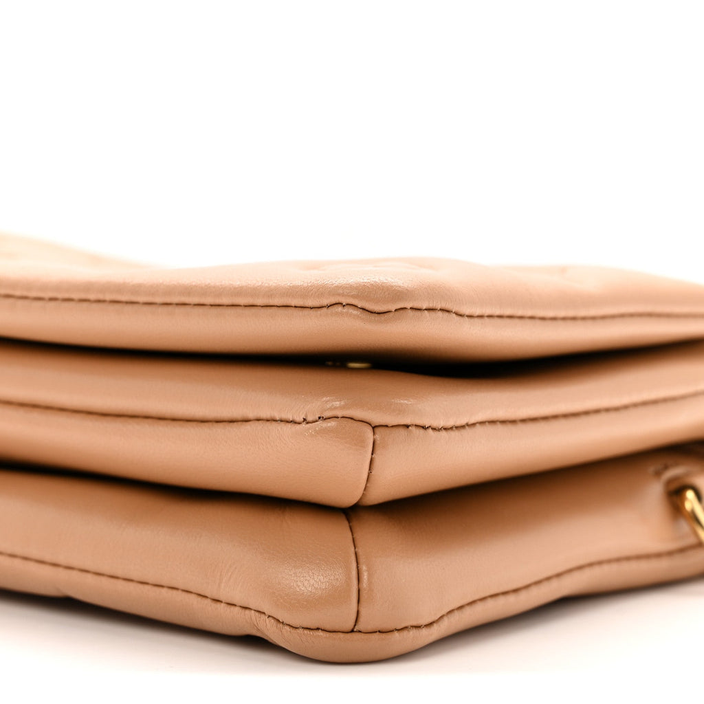 Lambskin Embossed Monogram Pochette Coussin Camel